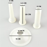 White plastic funnels and dish with measurements